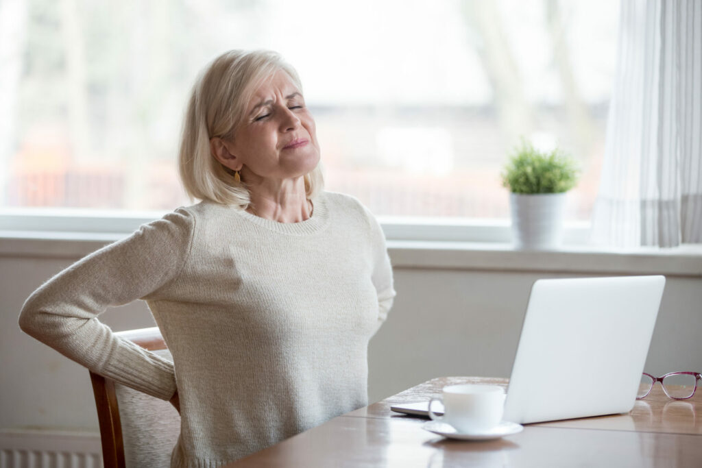 older woman with back pain