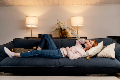 woman lying on the sofa