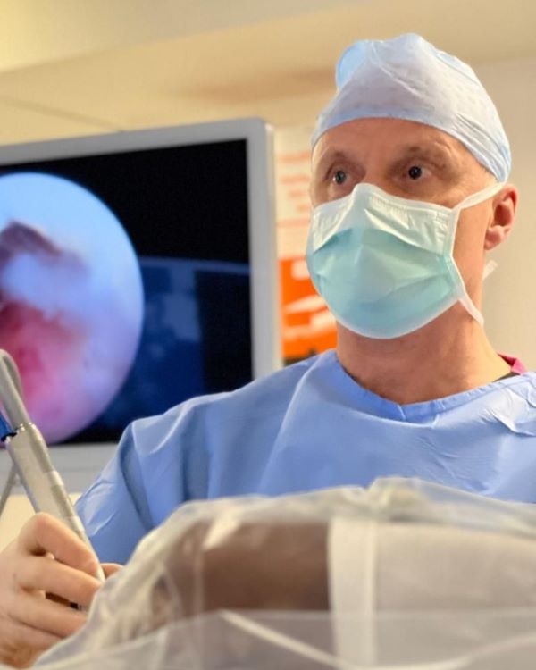 Professor Damian Griffin performing surgery